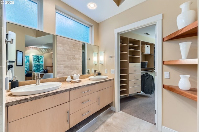 4300 SW Hewett Blvd, Portland, OR 97221 - ensuite bathroom featuring double vanity, healthy amount of natural light, and a spacious closet