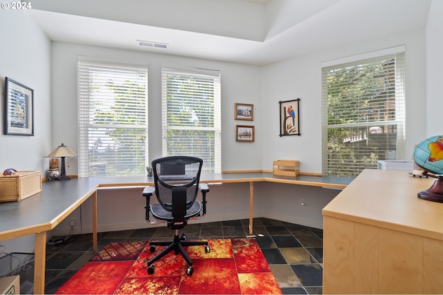 office area with built in desk