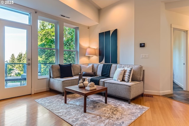 4300 SW Hewett Blvd, Portland, OR 97221 - living area with healthy amount of natural light and wood finished floors