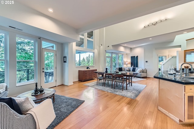 4300 SW Hewett Blvd, Portland, OR 97221 - living area with light wood-style floors and french doors