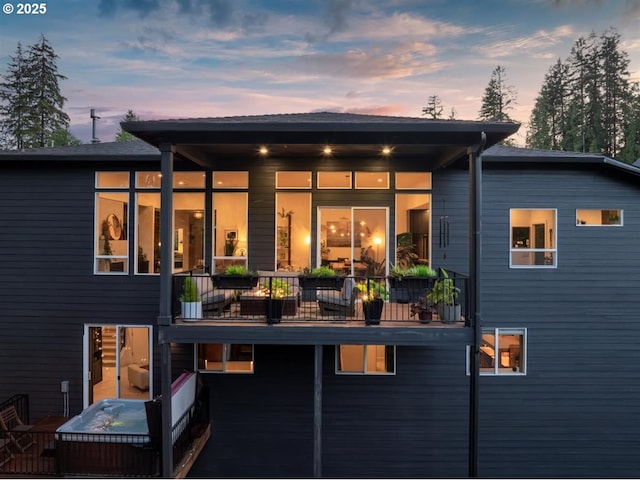 720 S 19th Pl, Ridgefield, WA 98642 - back of property at dusk with a balcony