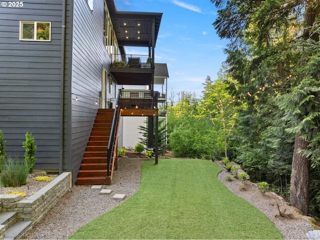 720 S 19th Pl, Ridgefield, WA 98642 - view of green lawn featuring a balcony and stairs