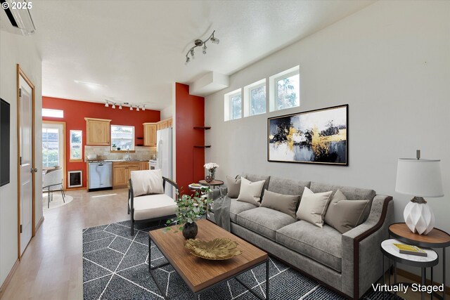 1106 Wilson St, Hood River, OR 97031 - living room featuring track lighting and light wood-style floors