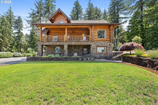 93011 Labeck Rd, Astoria, OR 97103 - log home featuring a front lawn, log exterior, stone siding, and a balcony