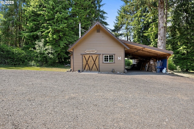 93011 Labeck Rd, Astoria, OR 97103 - view of outbuilding with gravel driveway
