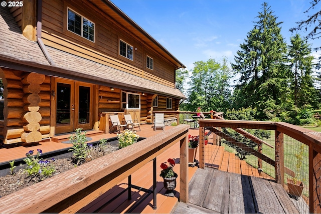 93011 Labeck Rd, Astoria, OR 97103 - deck featuring french doors and outdoor dining space