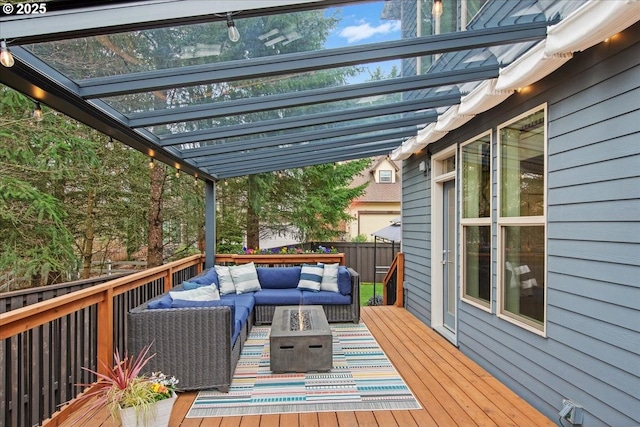 deck featuring an outdoor living space, fence, and a pergola