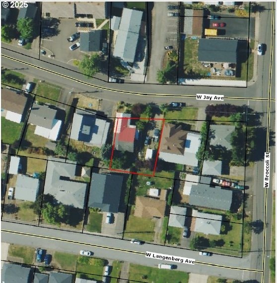 aerial view of property's location featuring property parcel outlined