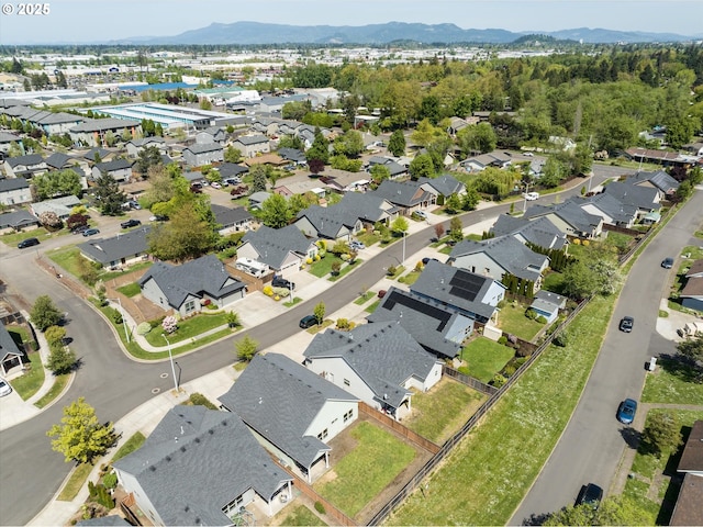 aerial view with a residential view and a mountain view