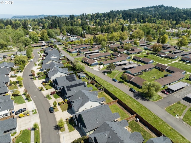 bird's eye view with a view of trees and a residential view