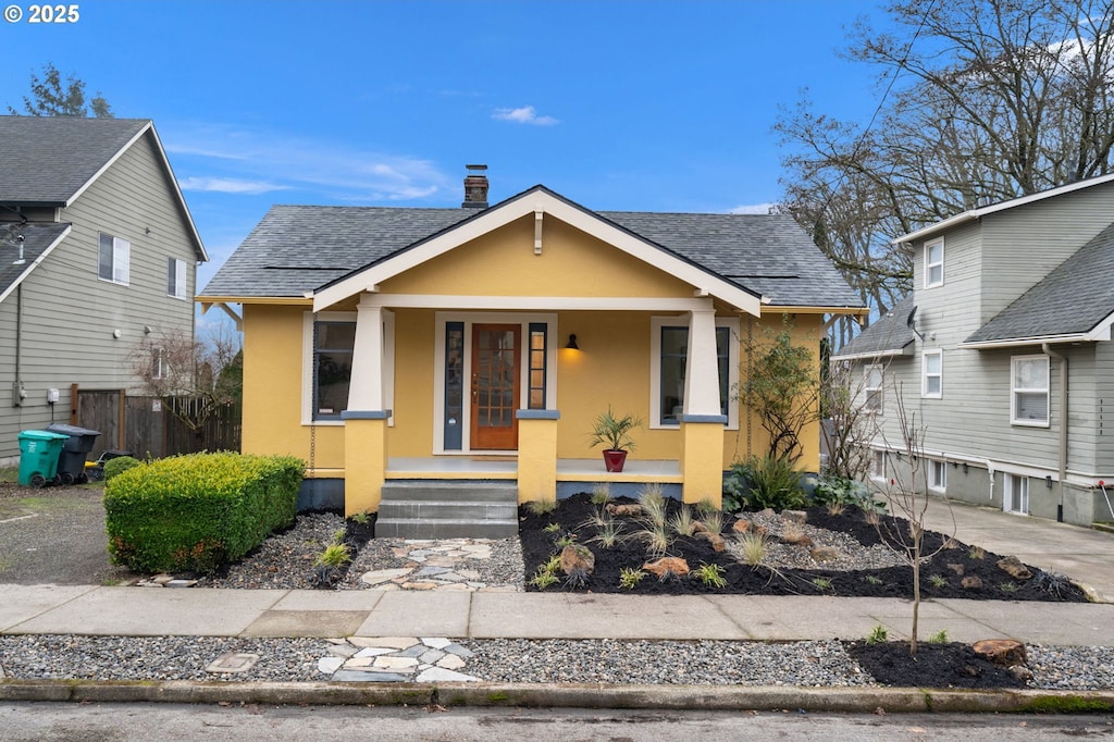 bungalow-style home featuring a porch