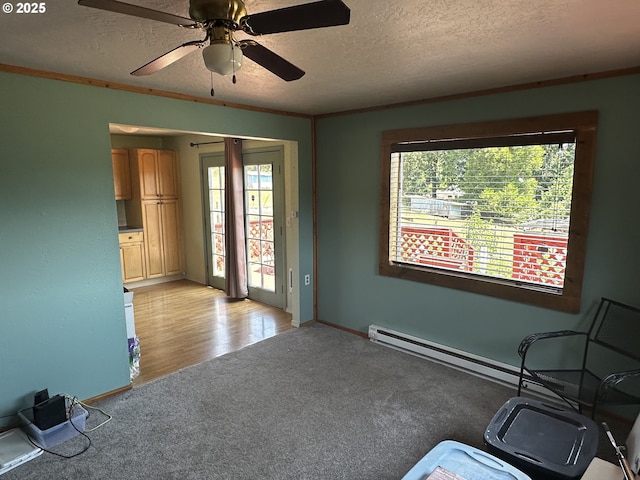 77668 Dugan Ln, Cottage Grove, OR 97424 - unfurnished room with light carpet, a textured ceiling, plenty of natural light, and a ceiling fan