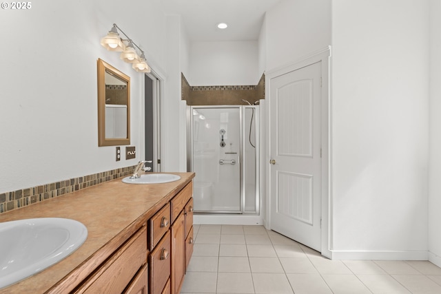1249 Zebrawood St, Florence, OR 97439 - full bathroom with tile patterned floors, a stall shower, and double vanity