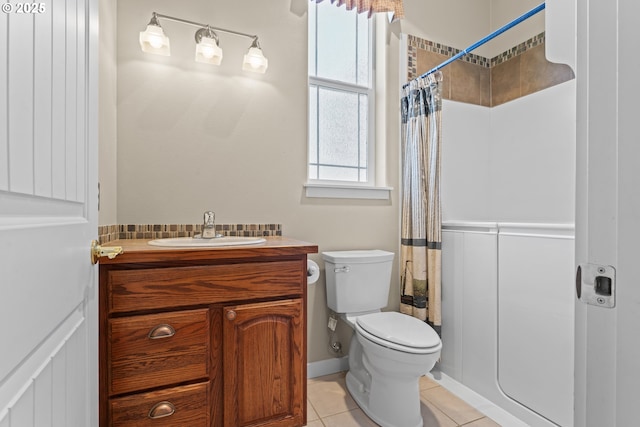 1249 Zebrawood St, Florence, OR 97439 - full bath featuring vanity, toilet, tile patterned floors, and baseboards