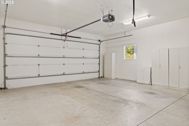 1249 Zebrawood St, Florence, OR 97439 - garage featuring a garage door opener