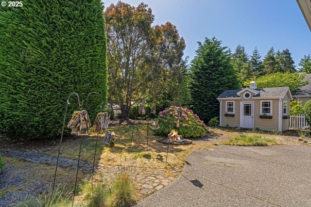 1249 Zebrawood St, Florence, OR 97439 - view of yard with an outbuilding