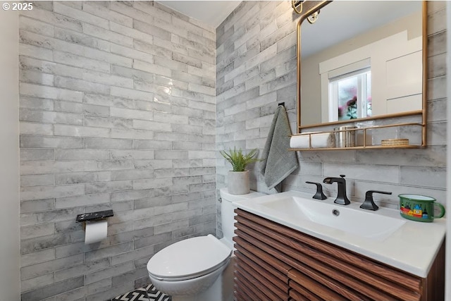 4038 NE Multnomah St, Portland, OR 97232 - half bathroom with vanity, tile walls, and tasteful backsplash