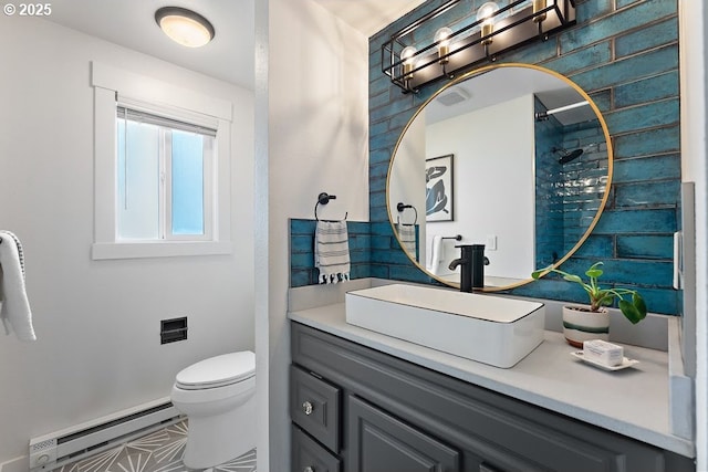 4038 NE Multnomah St, Portland, OR 97232 - full bathroom with a baseboard radiator, vanity, and a shower