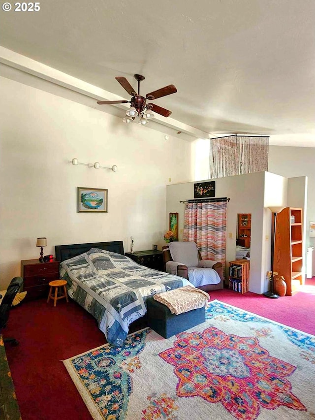 carpeted bedroom with lofted ceiling and ceiling fan