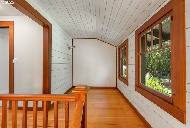 2517 Wild River Dr, Roseburg, OR 97470 - interior space featuring wood walls, light wood-style flooring, baseboards, vaulted ceiling, and wood ceiling