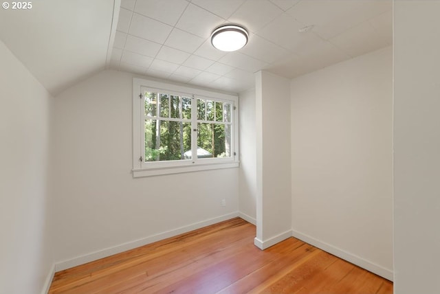 2517 Wild River Dr, Roseburg, OR 97470 - bonus room featuring baseboards, light wood finished floors, and lofted ceiling