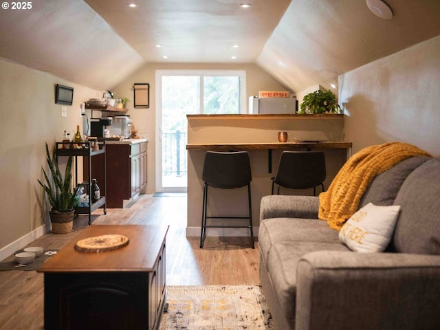 2517 Wild River Dr, Roseburg, OR 97470 - living room featuring light wood-style floors, baseboards, vaulted ceiling, and recessed lighting