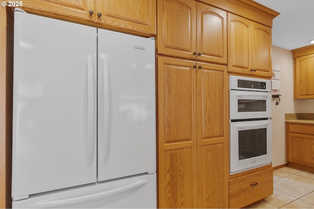 950 N Shasta Way, Clatskanie, OR 97016 - kitchen with white appliances, light tile patterned floors, and recessed lighting