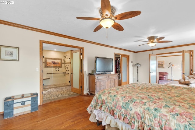 950 N Shasta Way, Clatskanie, OR 97016 - bedroom with ornamental molding, light wood-style flooring, baseboards, ceiling fan, and ensuite bathroom