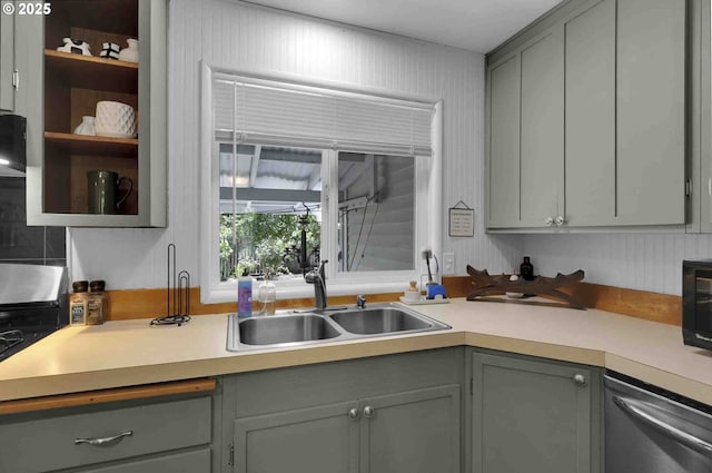 1335 Centennial Blvd, Springfield, OR 97477 - kitchen featuring gray cabinetry, stainless steel dishwasher, a sink, and light countertops