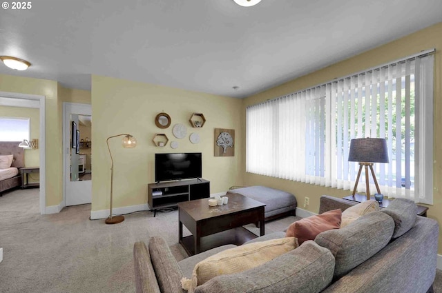 1335 Centennial Blvd, Springfield, OR 97477 - living room featuring healthy amount of natural light, carpet floors, and baseboards