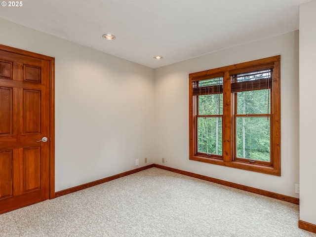 13200 NW Old Germantown Rd, Portland, OR 97035 - empty room featuring baseboards, light carpet, and recessed lighting