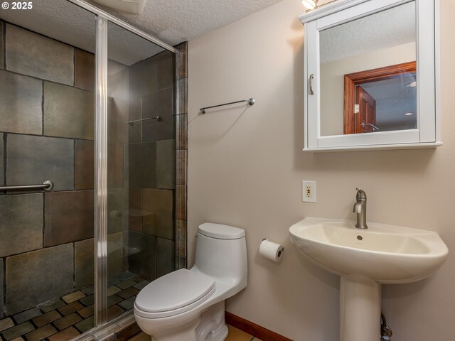 13200 NW Old Germantown Rd, Portland, OR 97035 - full bathroom with a textured ceiling, toilet, a stall shower, and a sink