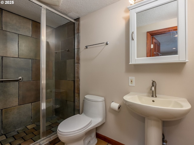13200 NW Old Germantown Rd, Portland, OR 97035 - full bathroom featuring a textured ceiling, toilet, a stall shower, and a sink
