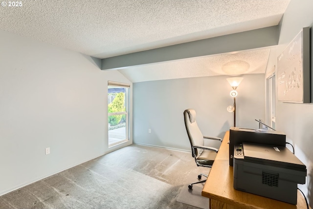 carpeted home office featuring lofted ceiling with beams and a textured ceiling