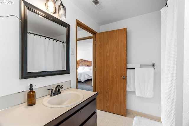 15205 NE 47th St, Vancouver, WA 98682 - ensuite bathroom with vanity and tile patterned flooring