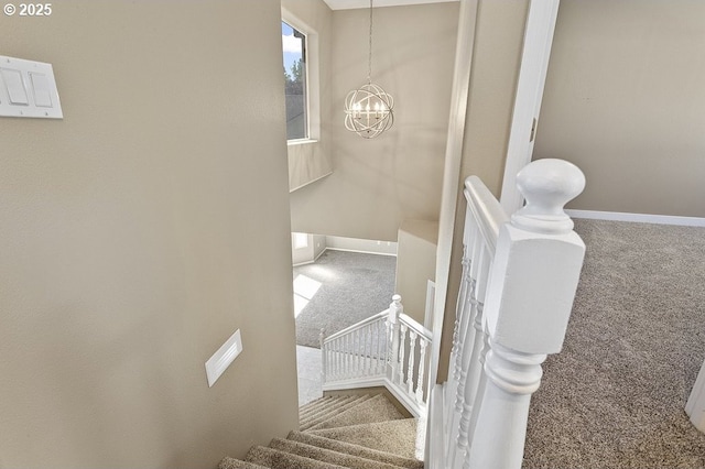 3317 SW Eastwood Ave, Gresham, OR 97080 - stairs featuring carpet, a chandelier, and baseboards