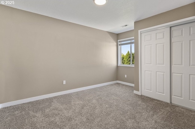 3317 SW Eastwood Ave, Gresham, OR 97080 - unfurnished bedroom featuring carpet floors, baseboards, and a closet