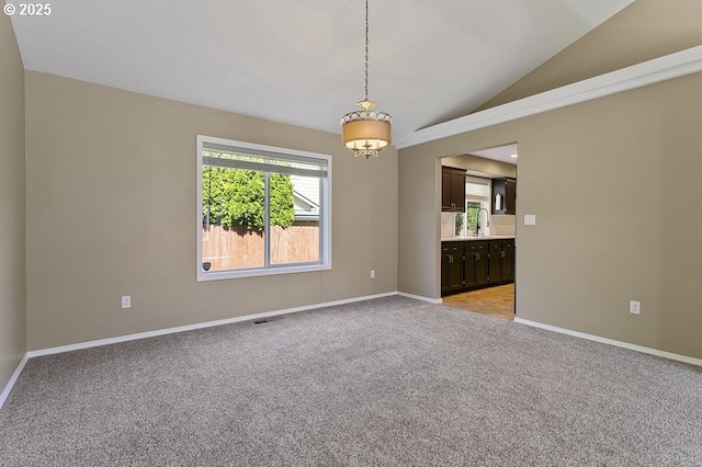 3317 SW Eastwood Ave, Gresham, OR 97080 - empty room with light carpet, a chandelier, baseboards, and lofted ceiling