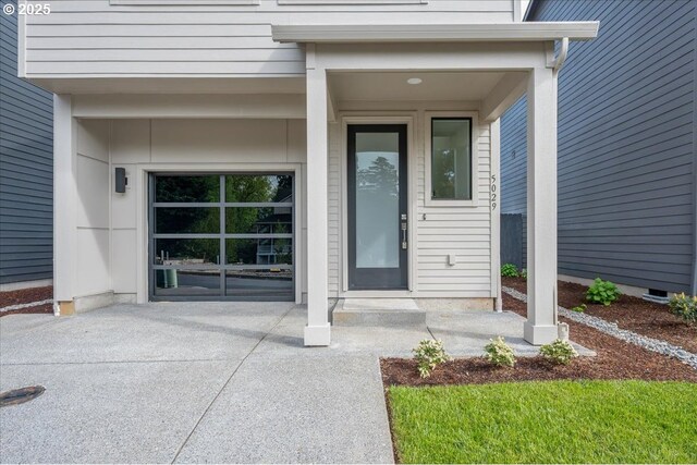 entrance foyer featuring light wood finished floors and baseboards