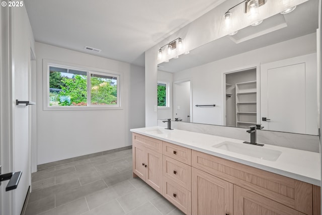 1908 50th St, Washougal, WA 98671 - bathroom with double vanity and tile patterned floors