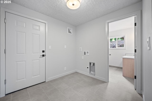 1908 50th St, Washougal, WA 98671 - washroom with hookup for an electric dryer, hookup for a washing machine, and a textured ceiling