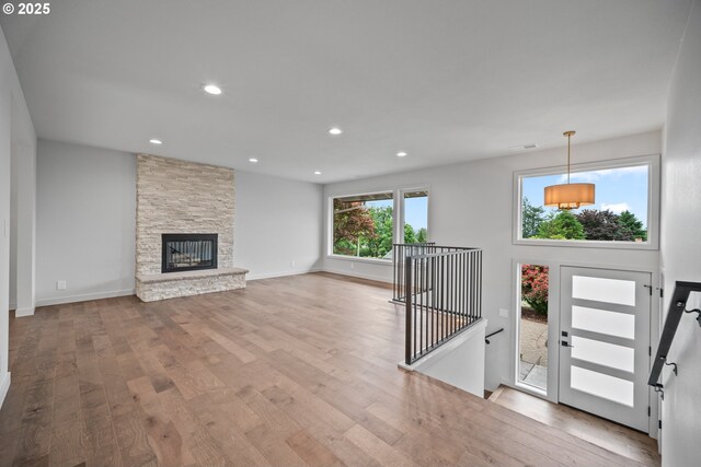 1908 50th St, Washougal, WA 98671 - entrance foyer with wood finished floors, recessed lighting, and a stone fireplace