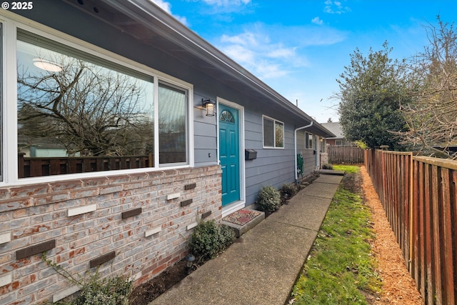 property entrance with fence