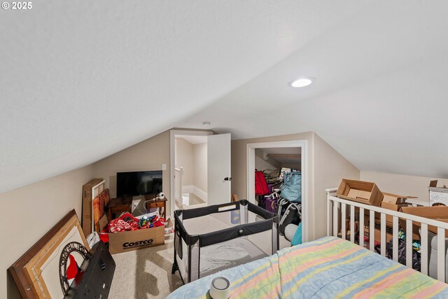 bedroom featuring carpet flooring, vaulted ceiling, and recessed lighting