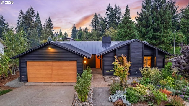 view of front of home featuring a garage