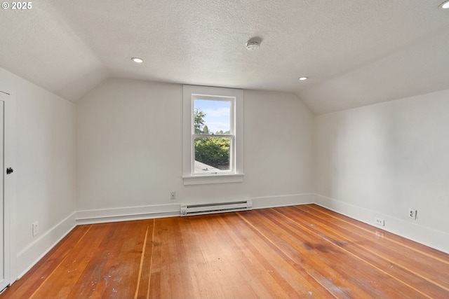 5655 SW Lombard Ave, Beaverton, OR 97005 - bonus room featuring a baseboard heating unit, vaulted ceiling, hardwood / wood-style floors, a textured ceiling, and recessed lighting