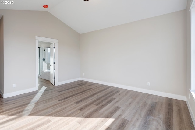 414 Hedin Ter, Gaston, OR 97119 - unfurnished room with lofted ceiling, light wood-style floors, and baseboards