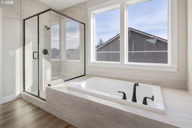 414 Hedin Ter, Gaston, OR 97119 - bathroom with a stall shower, a bath, and wood finished floors