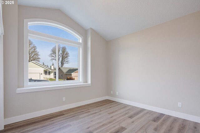 414 Hedin Ter, Gaston, OR 97119 - empty room with vaulted ceiling, wood finished floors, and baseboards