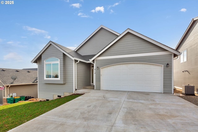 414 Hedin Ter, Gaston, OR 97119 - view of front facade with driveway, a garage, central AC, and a front yard